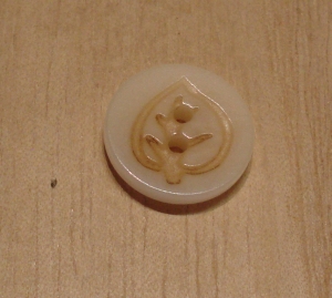 5/8" Cream Leaf Motif Corozo (Tagua Nut) Button