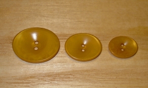 5/8" x 1/2" Soft Golden Tan Corozo (Tagua Nut) Oval Saucer Button