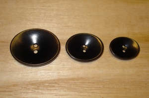 5/8" x 1/2" Jet Black Corozo (Tagua Nut) Oval Saucer Button