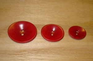 5/8" x 1/2" Cherry Red Corozo (Tagua Nut) Oval Saucer Button
