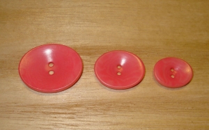 1 1/8" x 7/8" Bubblegum Corozo (Tagua Nut) Oval Saucer Button